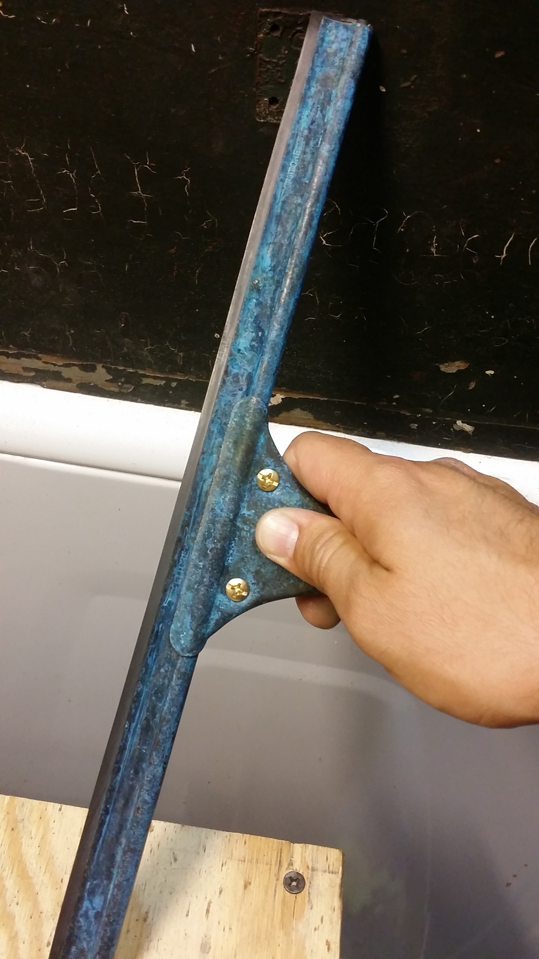 Forced patina on brass squeegee - The Garage - Window Cleaning Resource